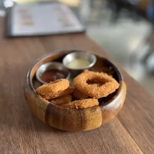 a bowl of fried onion rings