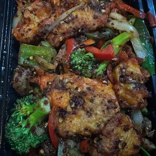 Cumin Fish has a spicy chili flavor in a dry stir-fry preparation.