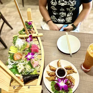 Sashimi Dinner, Gyoza, Thai Tea, spicy Salmon Hand Roll