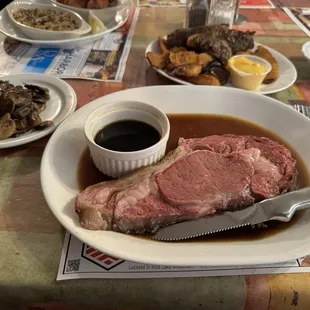 Smaller cut of prime rib ordered medium rare. Potato skins on the side.