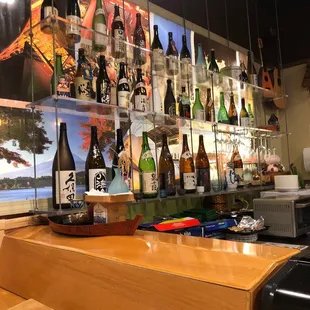 a bar with many bottles of wine