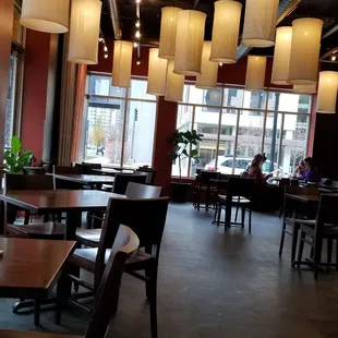 Indoor dining. Looks very nice and the kitchen is open.