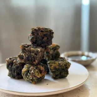 Chive Cake served with sweet black sauce 
Our new appetizer for this MAY 
*7 pieces per serving