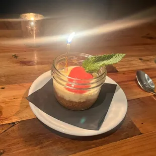 a dessert in a jar on a plate