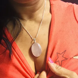 My purchase! It is high quality sterling silver adjustable. I think it's elegant and a a nice statement piece