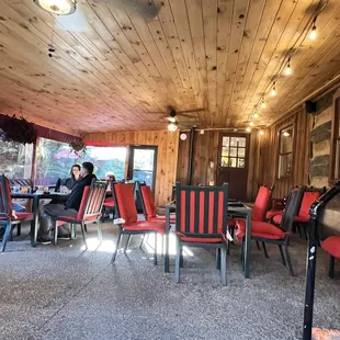 An enclosed outdoor seating area provided additional seating.