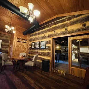 the inside of a rustic restaurant