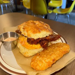 Chicken biscuit with hash brown.