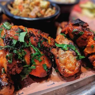 Tandoori chicken. Very good. Y'all...the marinade is pink, don't be stupid and think your chicken is raw.