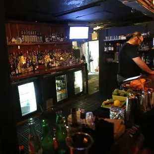 a bartender at the bar