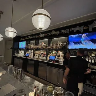 Love all the crowns &amp; tiaras above the bar