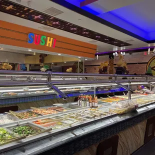 a buffet with a variety of food items