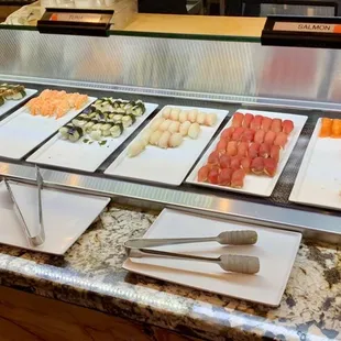 a variety of sushi and other foods