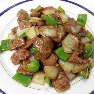 beef and vegetables on a plate