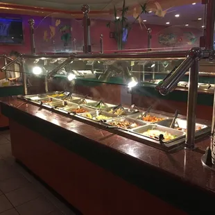 a buffet with a variety of food items