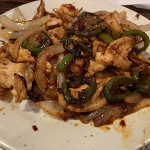 Hibachi chicken, onions, peppers, and jalapeños.  Ordered extra spicy and it didn't disappoint.