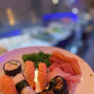 a plate of sushi on a table