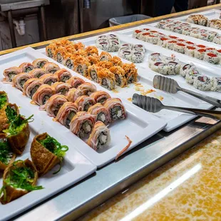 a variety of sushi and rolls