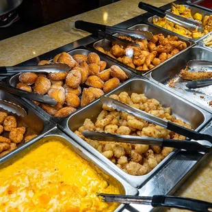 a variety of trays of food