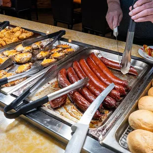 a variety of hot dogs and other foods