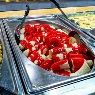 a variety of food items in a buffet