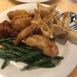 Crab Rangoon, sweet and sour chicken, and garlic green beans.