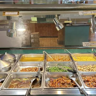 a variety of food items in a buffet