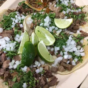 Lenua, steak, and carnitas taco