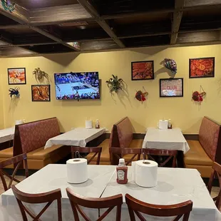 a restaurant with tables and chairs