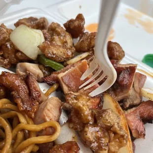 The chicken is so tough. The fork is starting to bend. Lol.