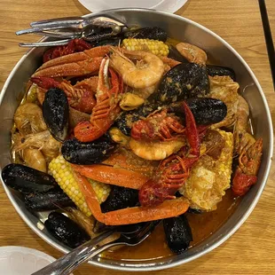 1 lb. Crawfish 2 Clusters Snow Crab Legs 1/2 lb head on shrimp 1 lb. Black Mussle