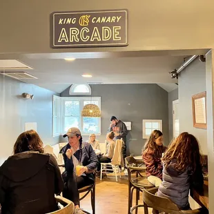 a group of people sitting at tables