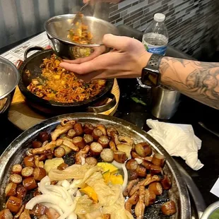 Large Intestine Combo Rice with Spicy Seasoned Octopus in Hot Stone Pot