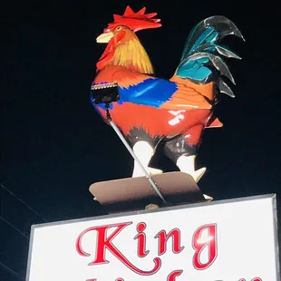 the sign for king chicken