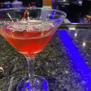 a drink in a martini glass