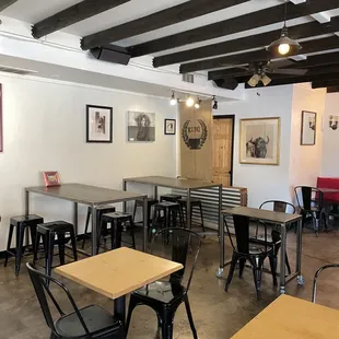 tables and chairs in a coffee shop