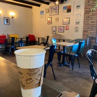 a cup of coffee on a table