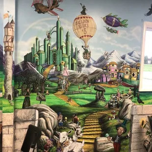 a mural in a children's playroom