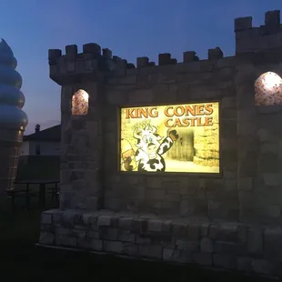 The King Cone's Castle sign and its iconic 10-foot ice cream cone at the entrance.