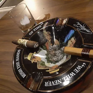 a cigar and a glass