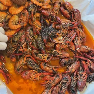a tray of craws and potatoes
