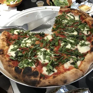 Basil topping pizza