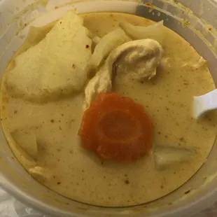 Yellow curry to-go, w/ chicken. DELICIOUS!!  Yellow Curry