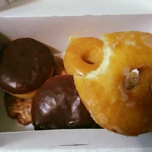 a variety of donuts in a box