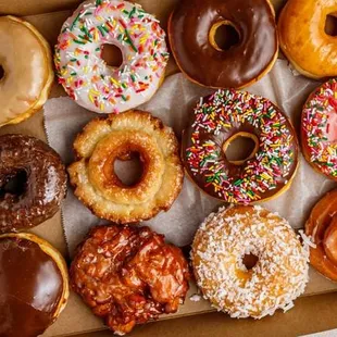 Assorted dozen of donuts