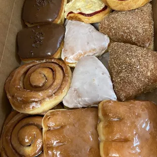 a variety of doughnuts in a box
