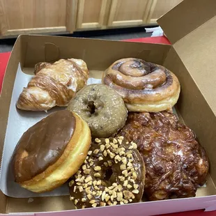 a variety of doughnuts in a box