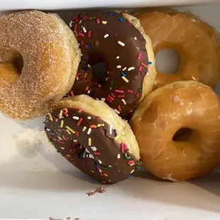 a variety of donuts in a box