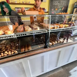 a man and a woman behind the counter