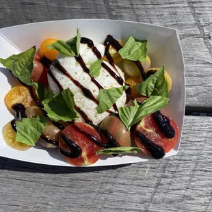 Seasonal special, Heirloom caprese salad with burrata, basil, balsamic reduction